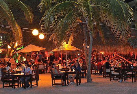Moomba beach bar & restaurant - Photos 379. 8.8/ 10. 284. ratings. Ranked #4 for breakfast food in Oranjestad. "Best place to be on a Sunday night with great musice💯®" (3 Tips) "Best bar on Palm Beach rt next to the Holiday Inn." (2 Tips) "Great spot, free lounge chairs and free (very fast) wifi."